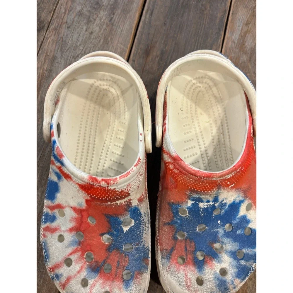 Crocs red, white and blue tie-dye slides